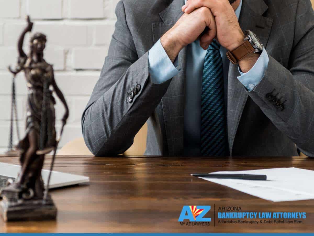  Bankruptcy attorney at desk with legal documents