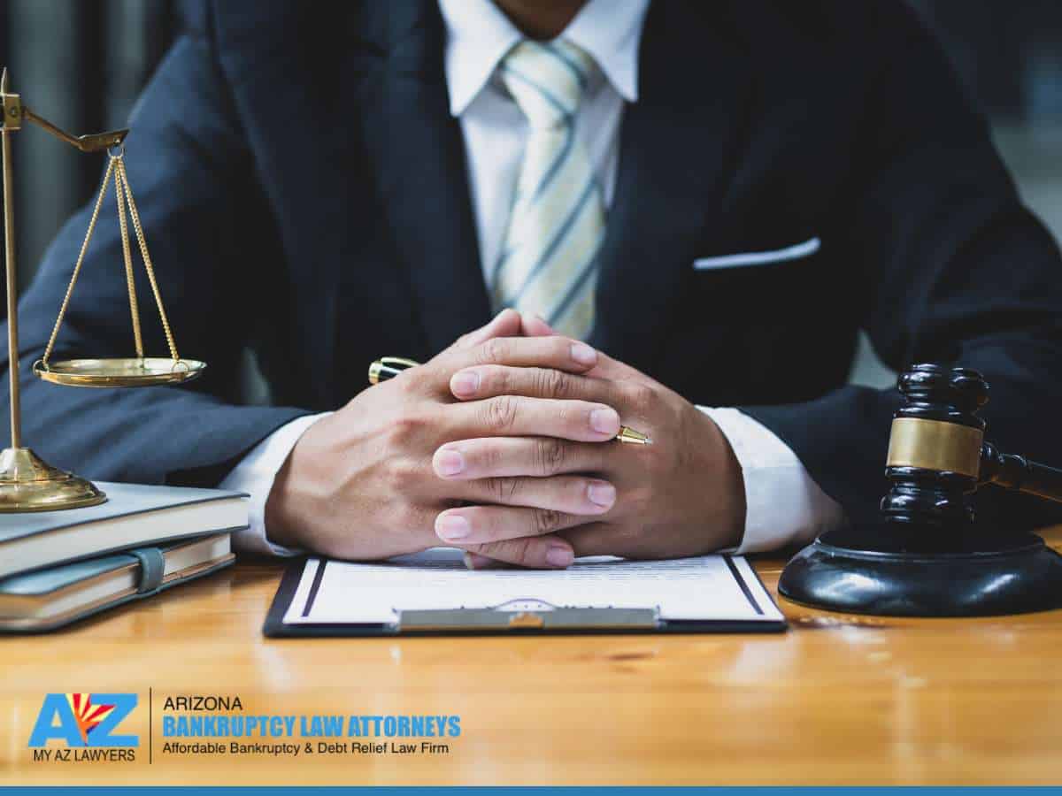 Bankruptcy in Arizona discussion with legal documents and gavel on desk